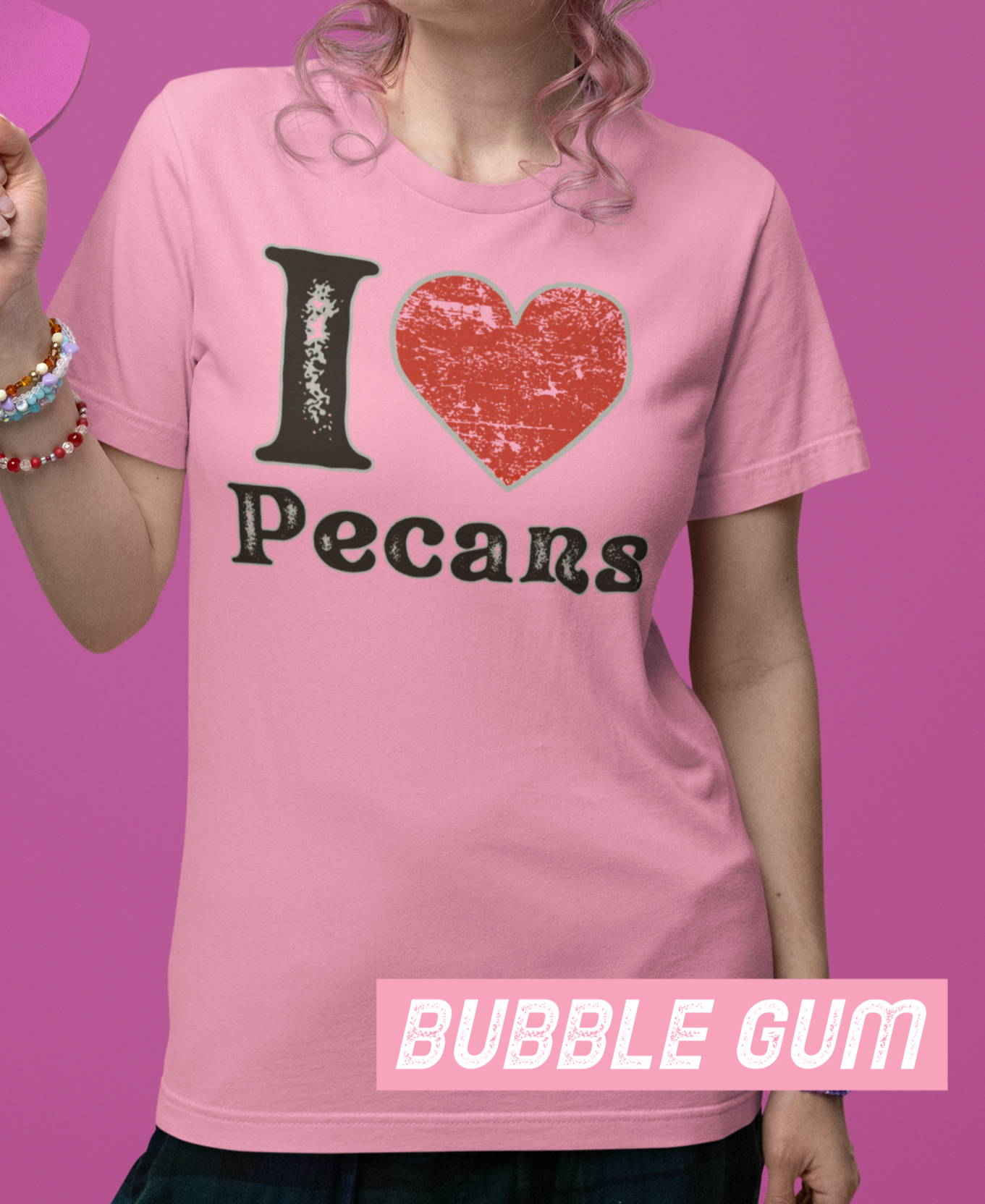 Lifestyle mockup of a Bella+Canvas 3001 unisex t-shirt featuring a distressed vintage I ❤ Pecans graphic, Southern Americana style, perfect for pecan lovers and nostalgic foodies.