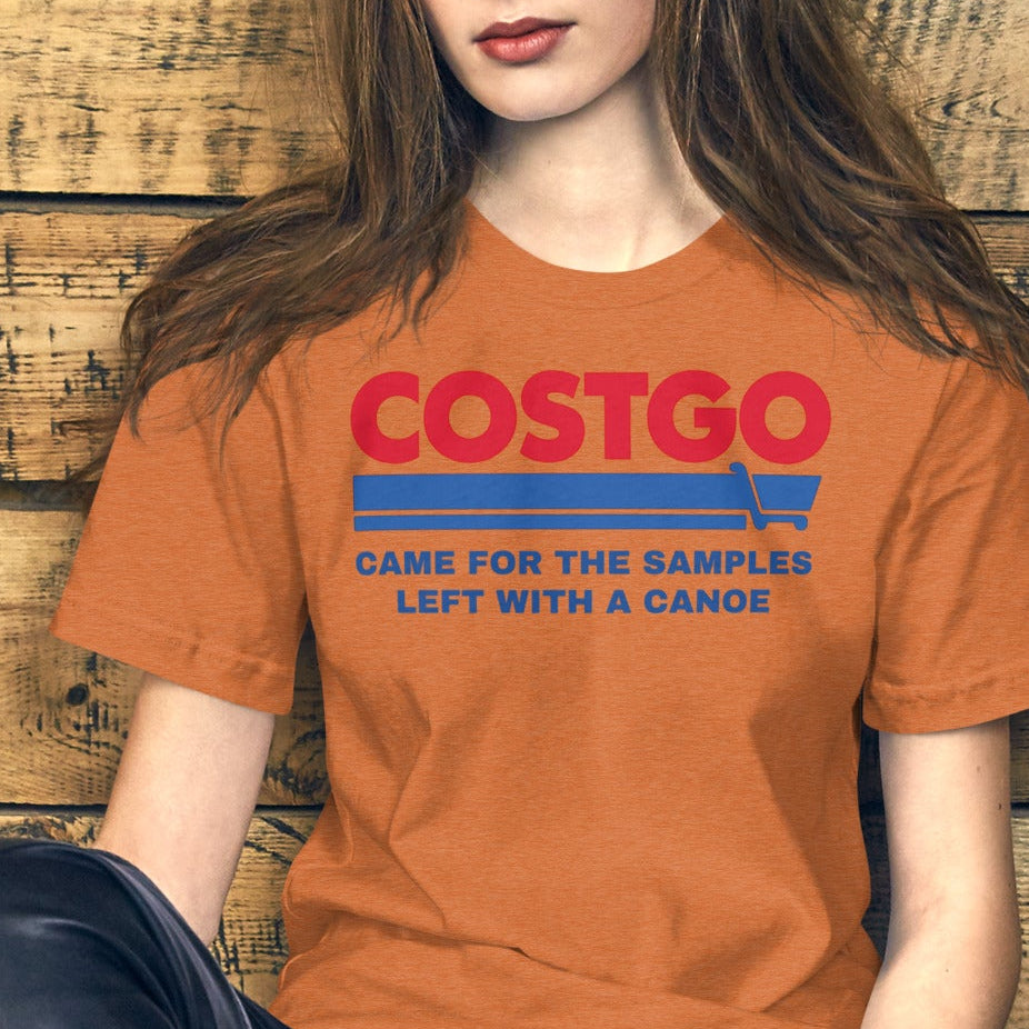 Costgo Samples Funny T-Shirt parodying Costco, printed on a soft unisex Bella + Canvas 3001 tee by NuttyMerch, featuring the phrase “Came for the Samples, Left with a Canoe.” Premium cotton blend, casual fit, and available in assorted colors.