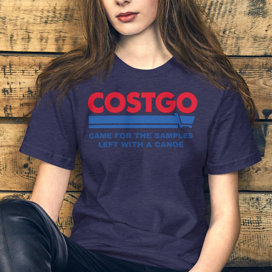 Costgo Samples Funny T-Shirt parodying Costco, printed on a soft unisex Bella + Canvas 3001 tee by NuttyMerch, featuring the phrase “Came for the Samples, Left with a Canoe.” Premium cotton blend, casual fit, and available in assorted colors.\\