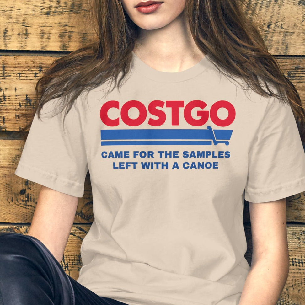 Costgo Samples Funny T-Shirt parodying Costco, printed on a soft unisex Bella + Canvas 3001 tee by NuttyMerch, featuring the phrase “Came for the Samples, Left with a Canoe.” Premium cotton blend, casual fit, and available in assorted colors.