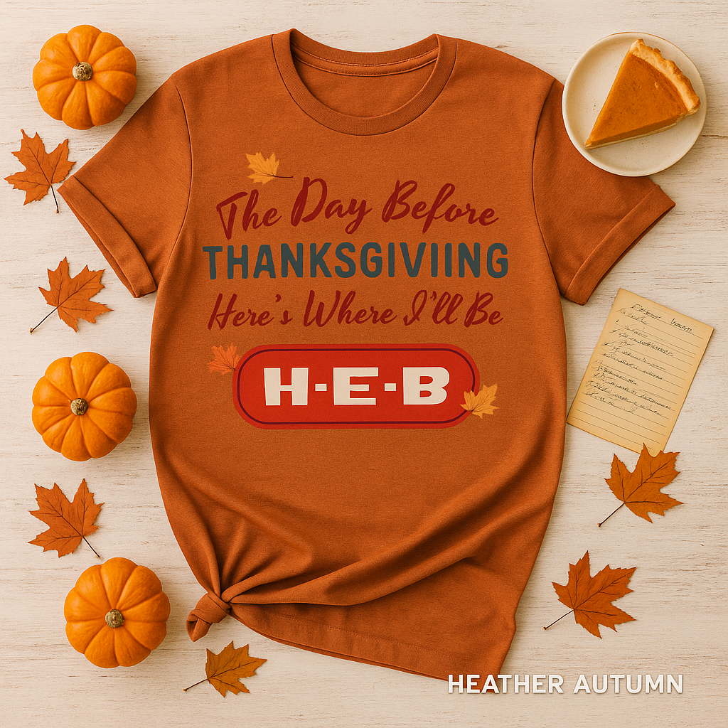 “Bella+Canvas 3001 Heather Autumn t-shirt featuring nostalgic Thanksgiving design with H-E-B logo, surrounded by pumpkins, fall leaves, and pie on a rustic wooden backdrop.”