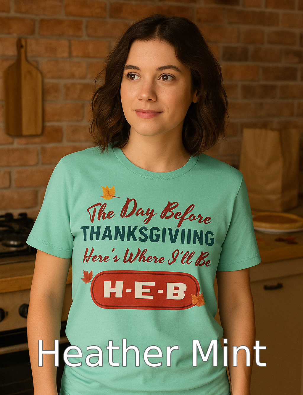 “Bella+Canvas 3001 Heather Mint t-shirt with retro NuttyMerch Thanksgiving message, worn by a female model in a rustic kitchen scene with pie and autumn accents.”
