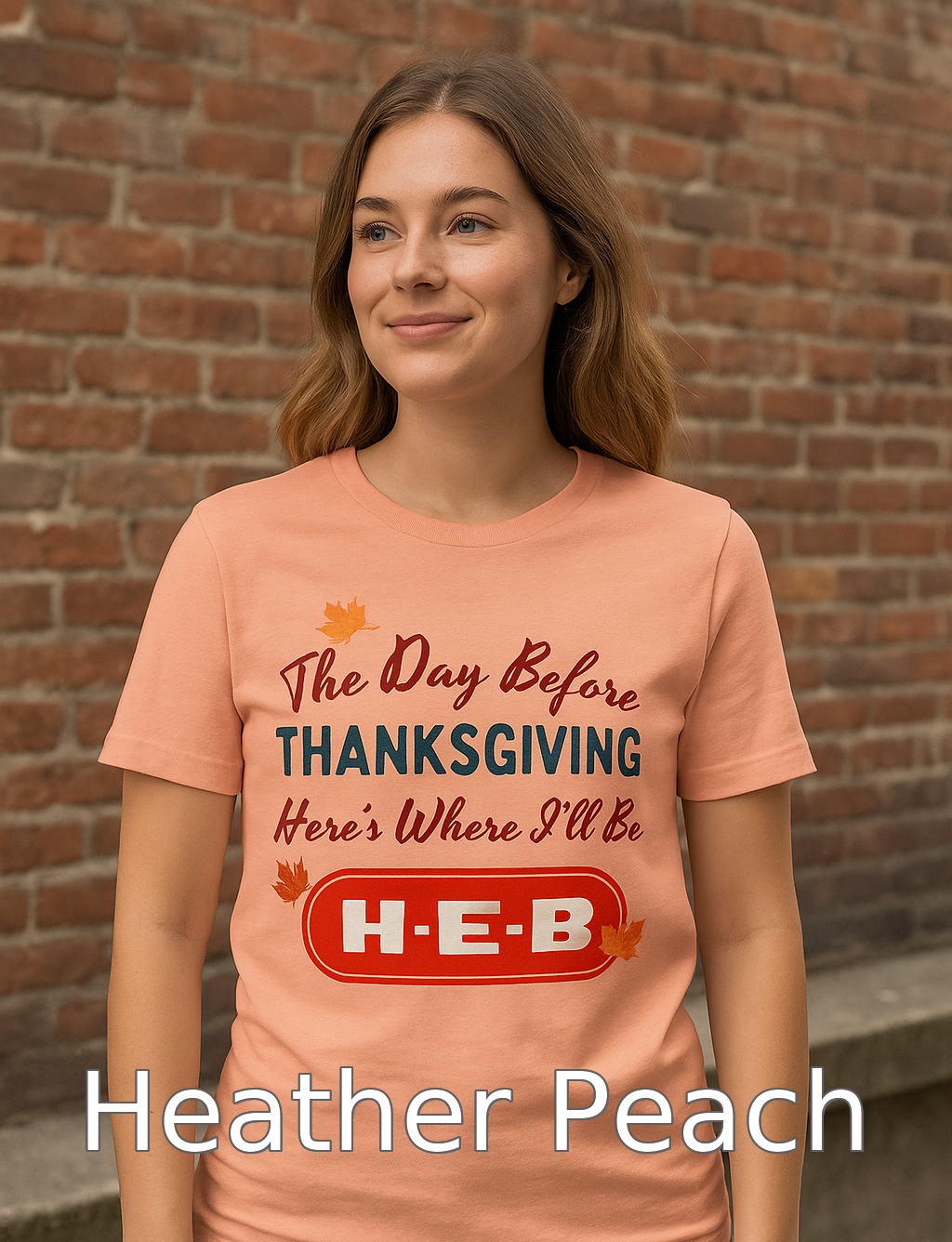 “Bella+Canvas 3001 Heather Peach t-shirt featuring NuttyMerch ‘Day Before Thanksgiving’ design, styled on a female model in a warm rustic kitchen with pie, pumpkins, and autumn leaves.”