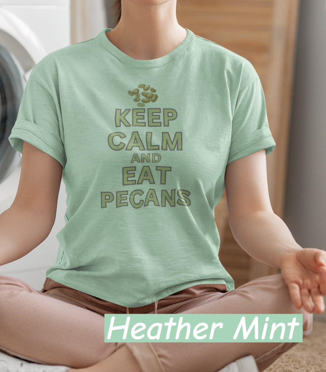 “Bella+Canvas 3001 unisex t-shirt with NuttyMerch design. Pecan Pete graphic and the phrase ‘Keep Calm and Eat Pecans.’ Funny foodie Americana shirt.”
