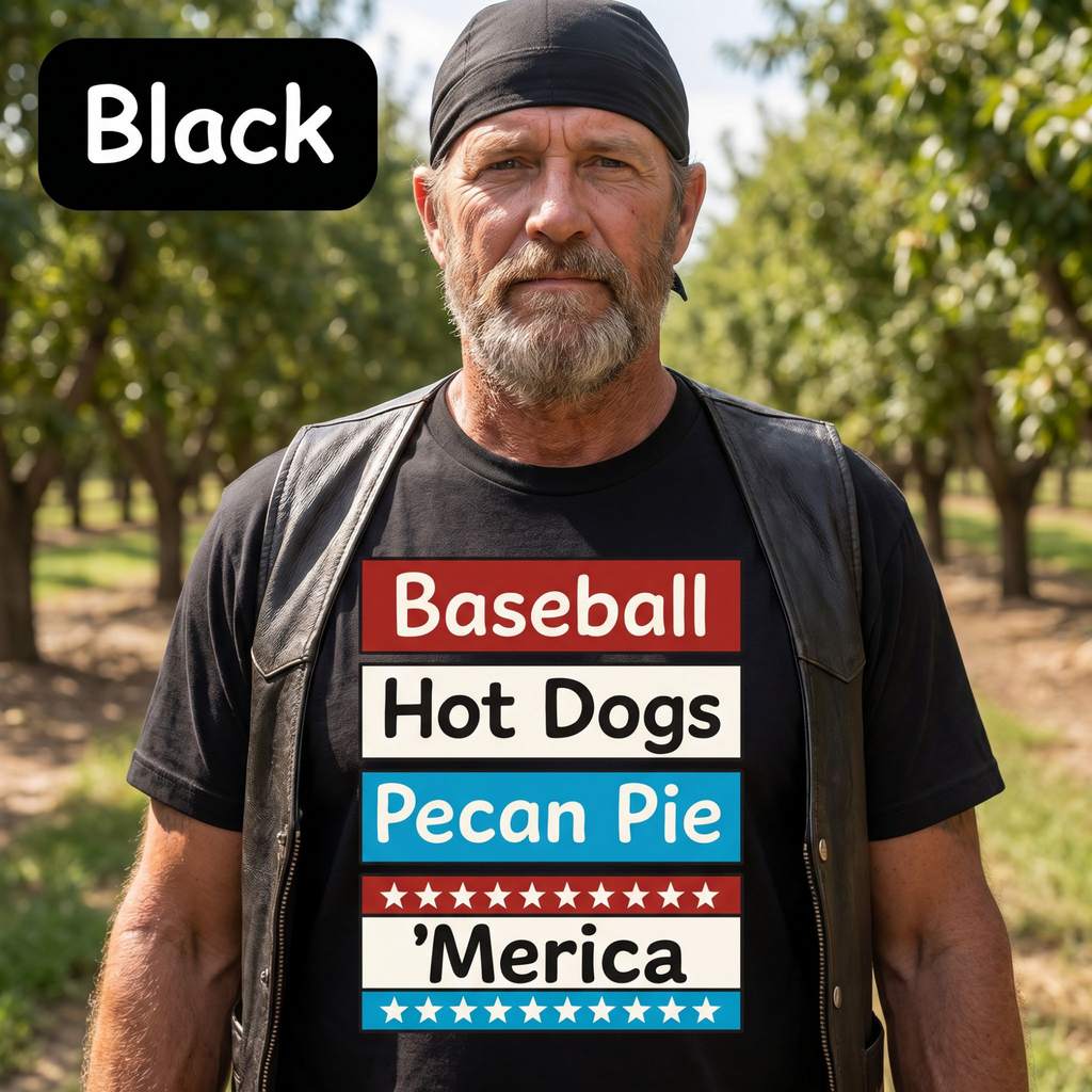 Man wearing a black t-shirt with colorful text in an outdoor setting