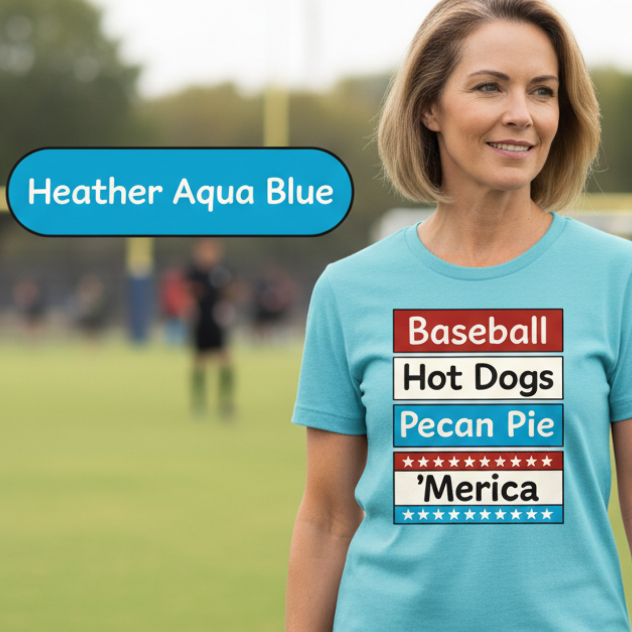 Woman wearing a blue t-shirt with text on a sports field background