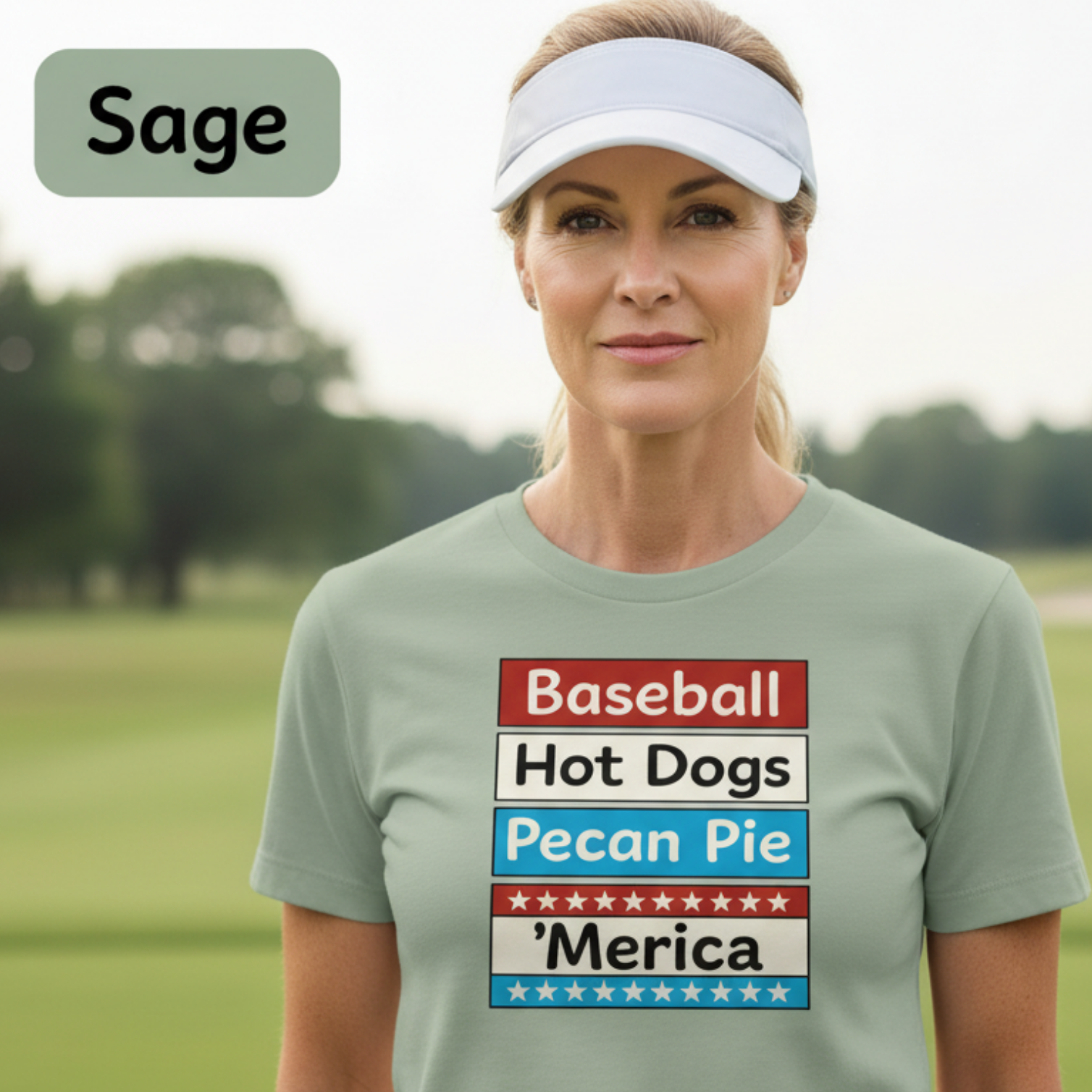 Woman wearing a sage t-shirt with text on a golf course