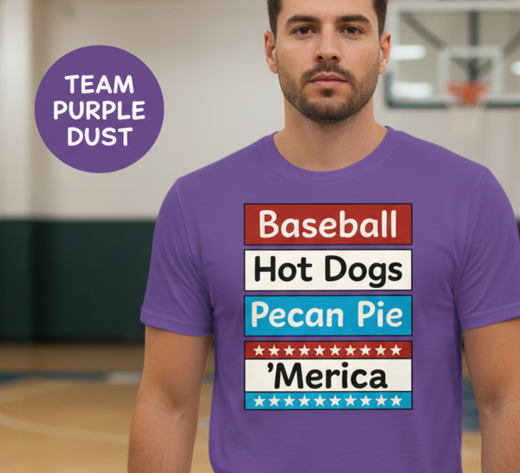 Man wearing a purple t-shirt with colorful text in a gymnasium