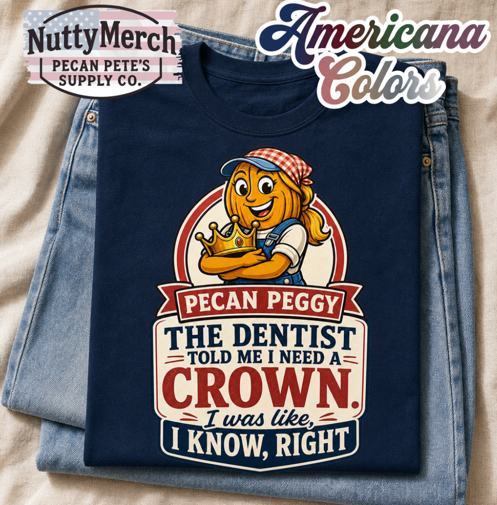 A navy blue graphic T-shirt folded on top of light blue jeans, with a visible 'Nutty Merch Pecan Pete's Supply Co.' logo in the top-left and an 'America Colors' watermark at the top-right.