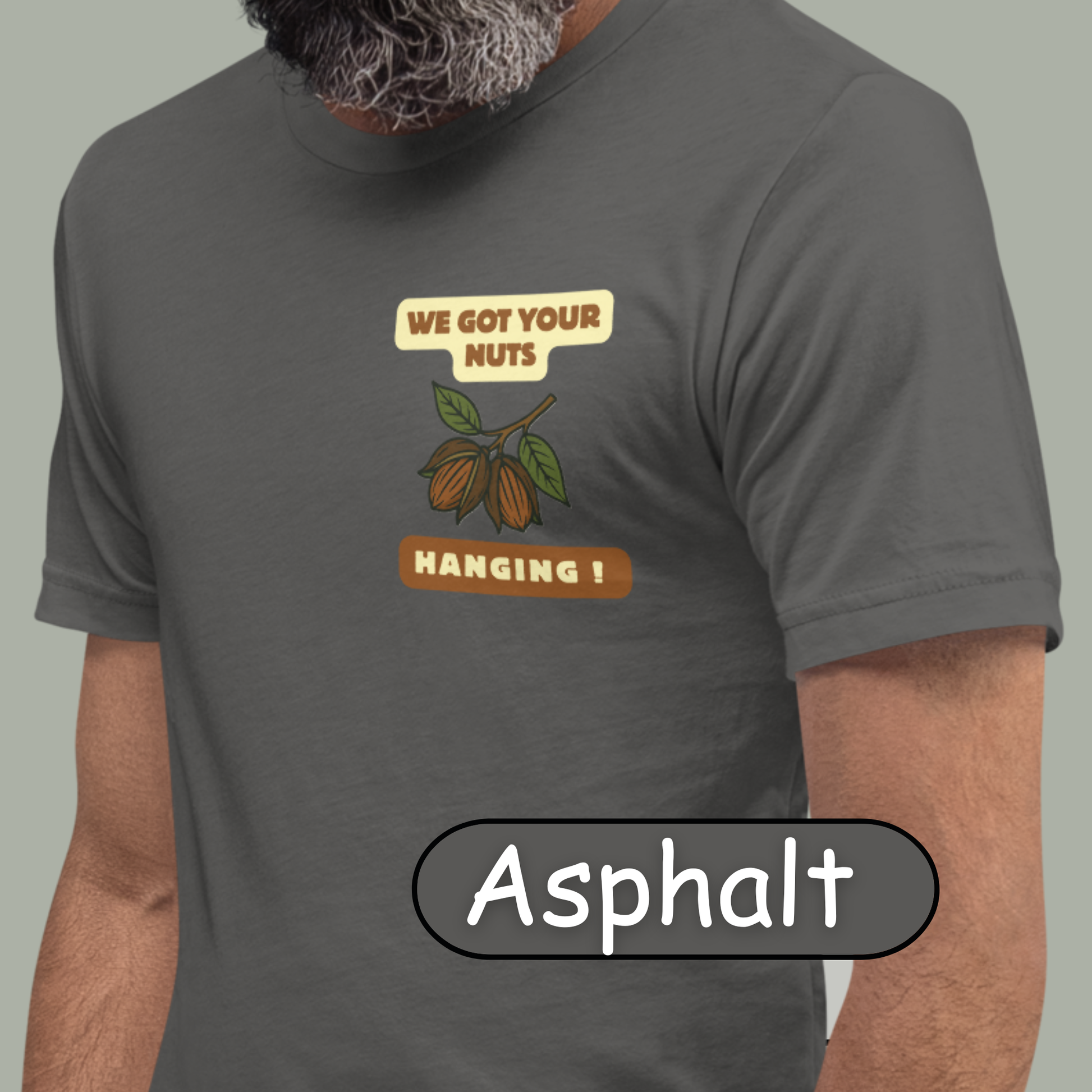 “NuttyMerch We Got Your Nuts Hanging parody graphic with pecans in husks and leaves printed on the upper left chest of a Bella + Canvas 3001 t-shirt”