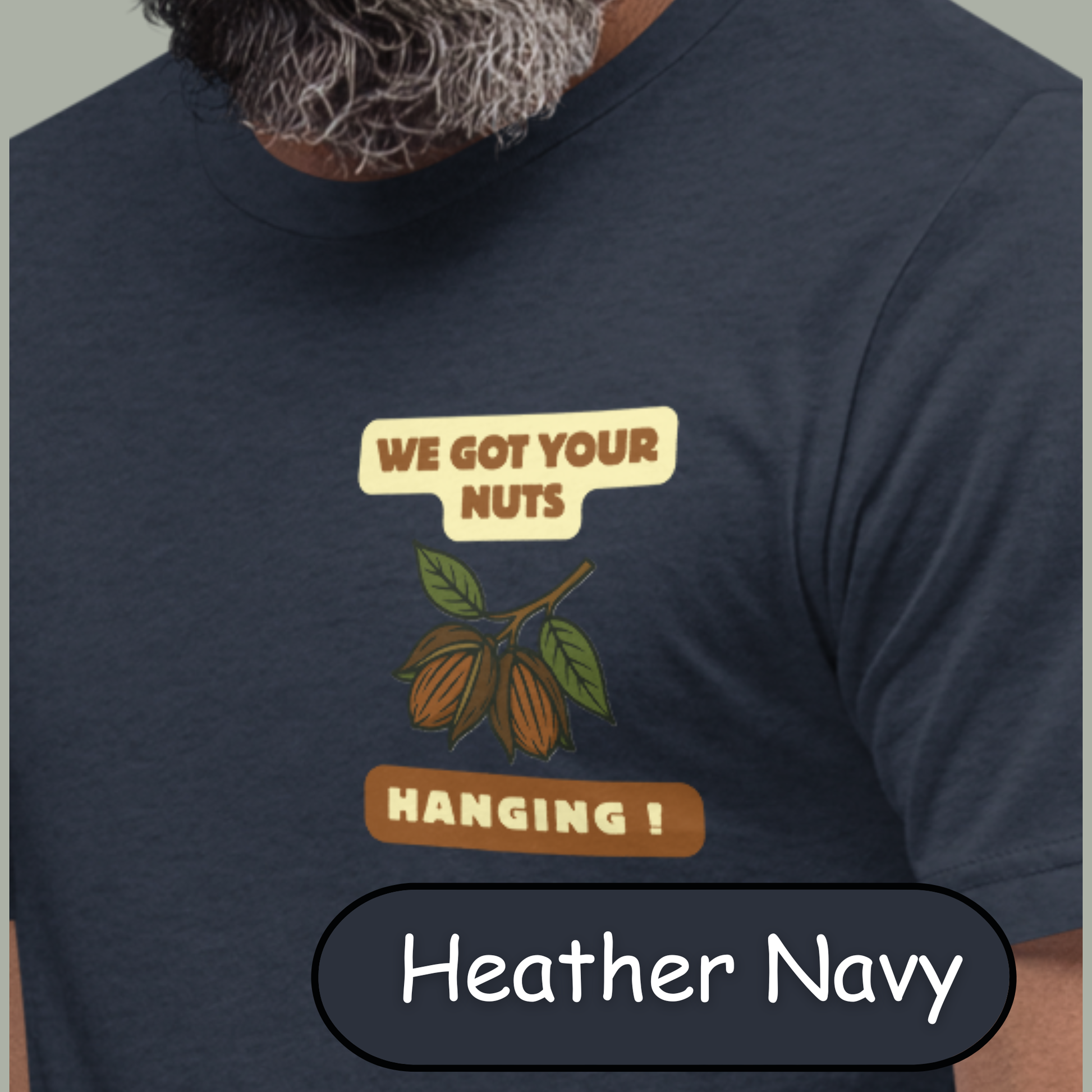 “NuttyMerch We Got Your Nuts Hanging parody graphic with pecans in husks and leaves printed on the upper left chest of a Bella + Canvas 3001 t-shirt”