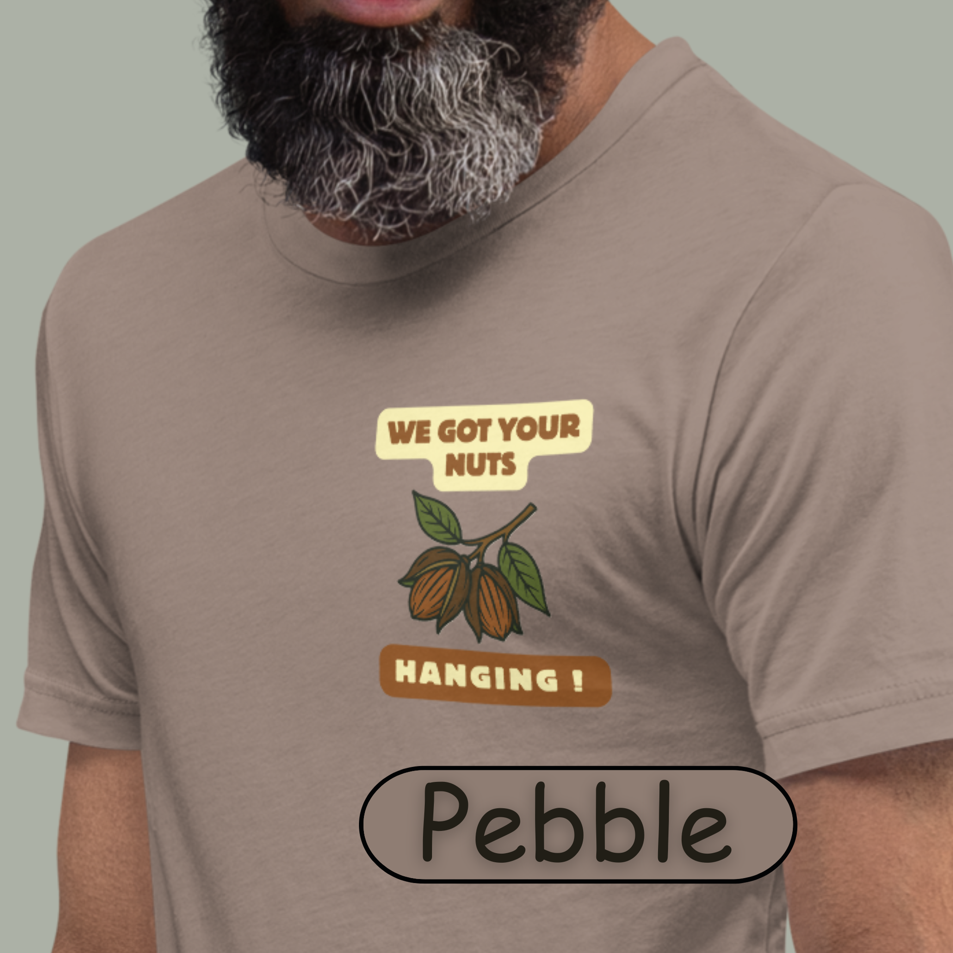 “NuttyMerch We Got Your Nuts Hanging parody graphic with pecans in husks and leaves printed on the upper left chest of a Bella + Canvas 3001 t-shirt”