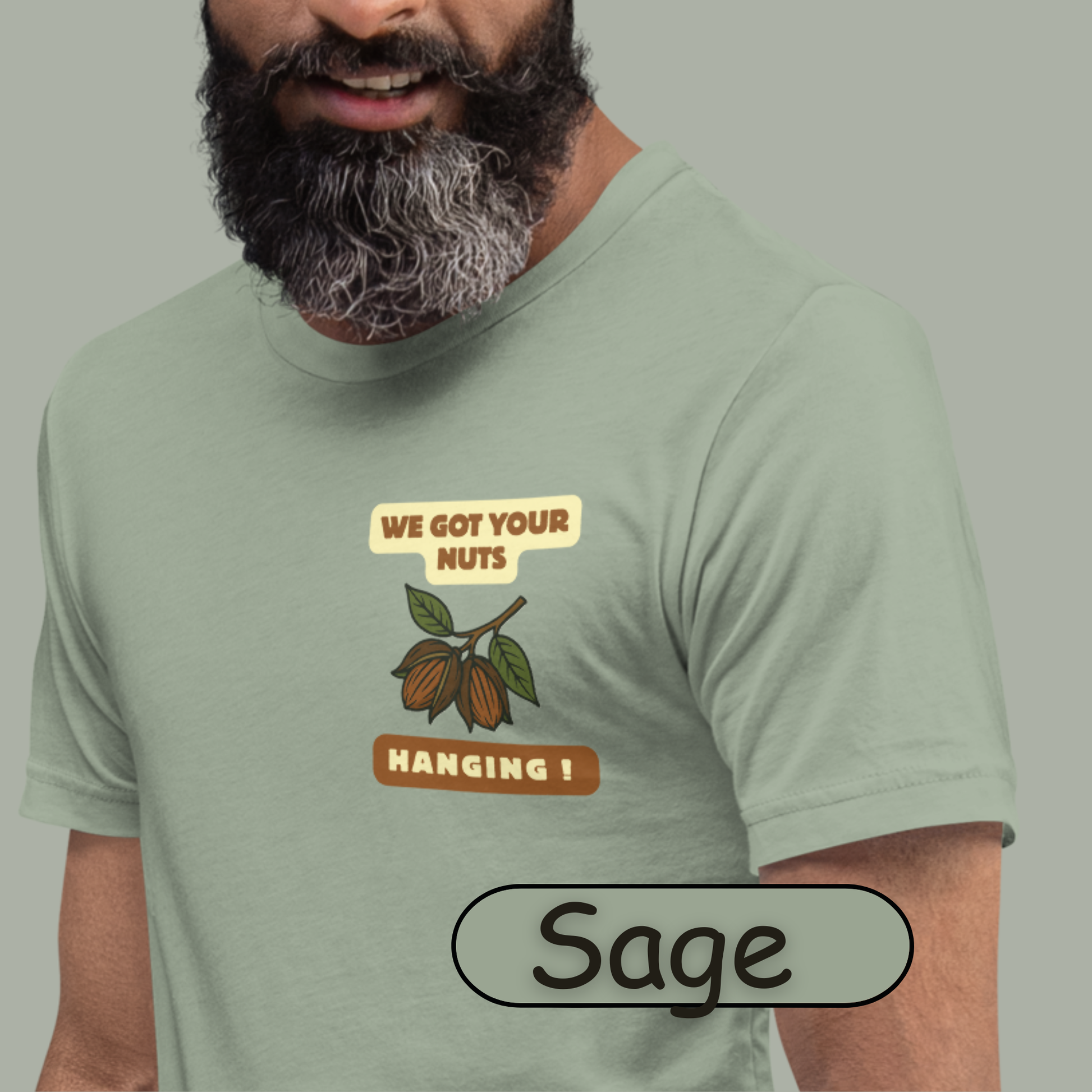 “NuttyMerch We Got Your Nuts Hanging parody graphic with pecans in husks and leaves printed on the upper left chest of a Bella + Canvas 3001 t-shirt”