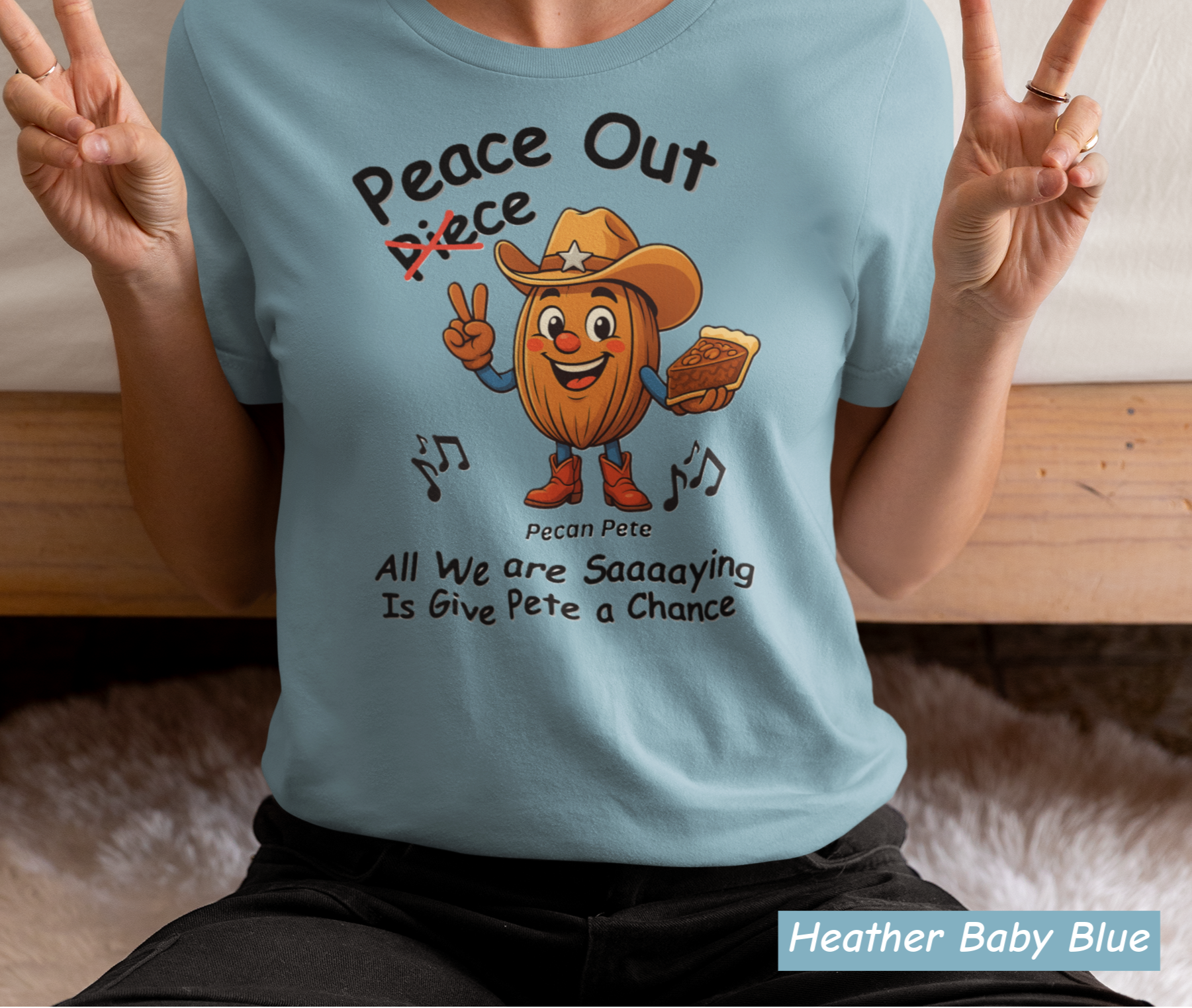 “Pecan Pete cowboy tee with peace sign and piece of pie, fun play on peace out vs piece out.”