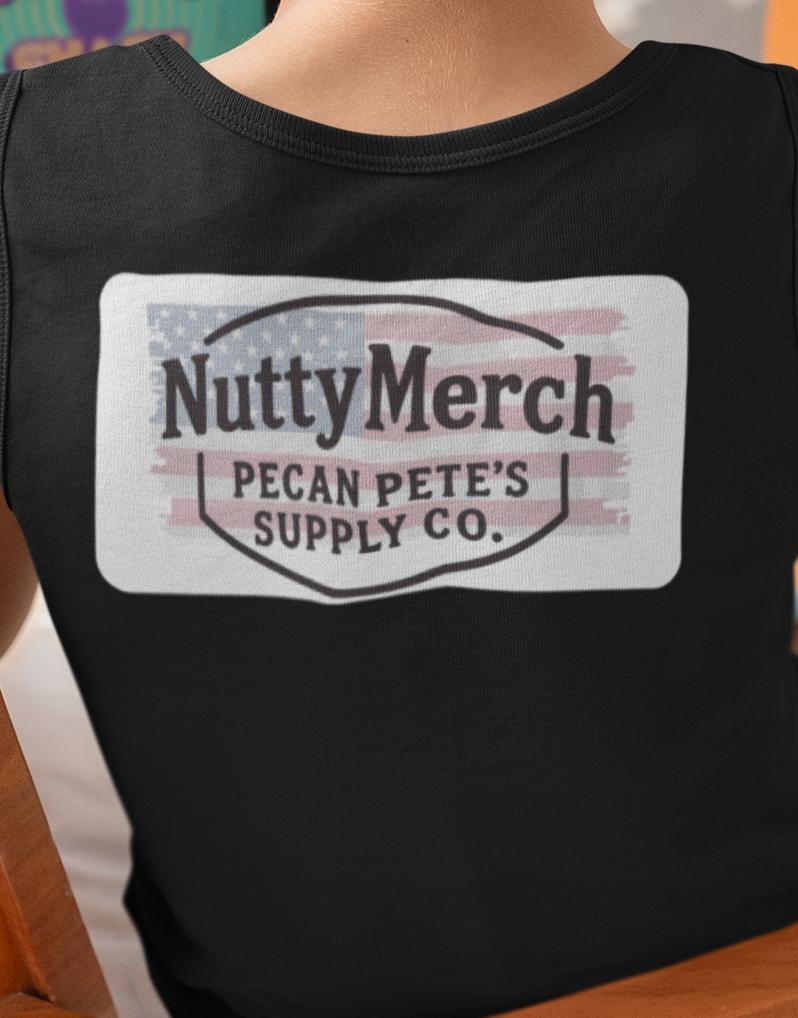Back view of unisex Bella + Canvas 3483 muscle tank in black featuring Pecan Pete holding American flag and pecan pie, gym wear design.