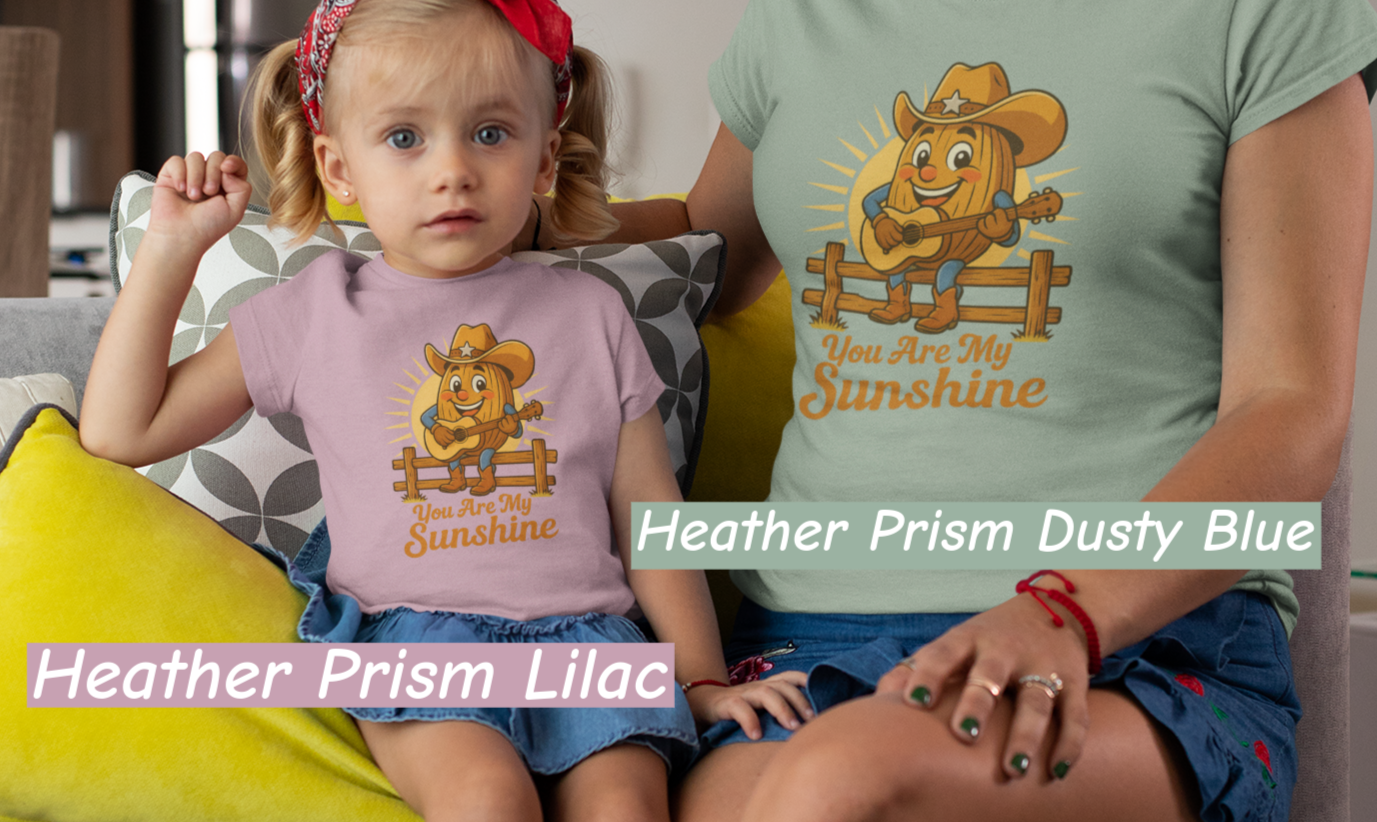 Mother and daughter wearing Bella+Canvas 3001 t-shirt with Pecan Pete singing cowboy design and the phrase You Are My Sunshine, vintage western style graphic tee