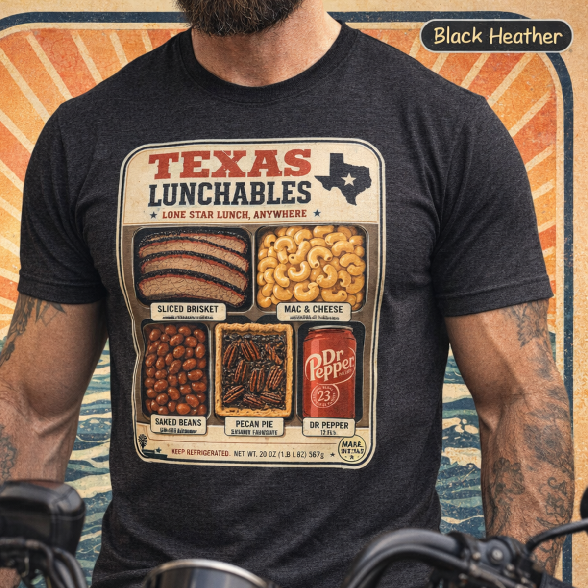 Vintage-style "Texas Lunchables" graphic tee illustrating a classic Texan BBQ meal with brisket, mac and cheese, pecan pie, beans, and a soft drink.