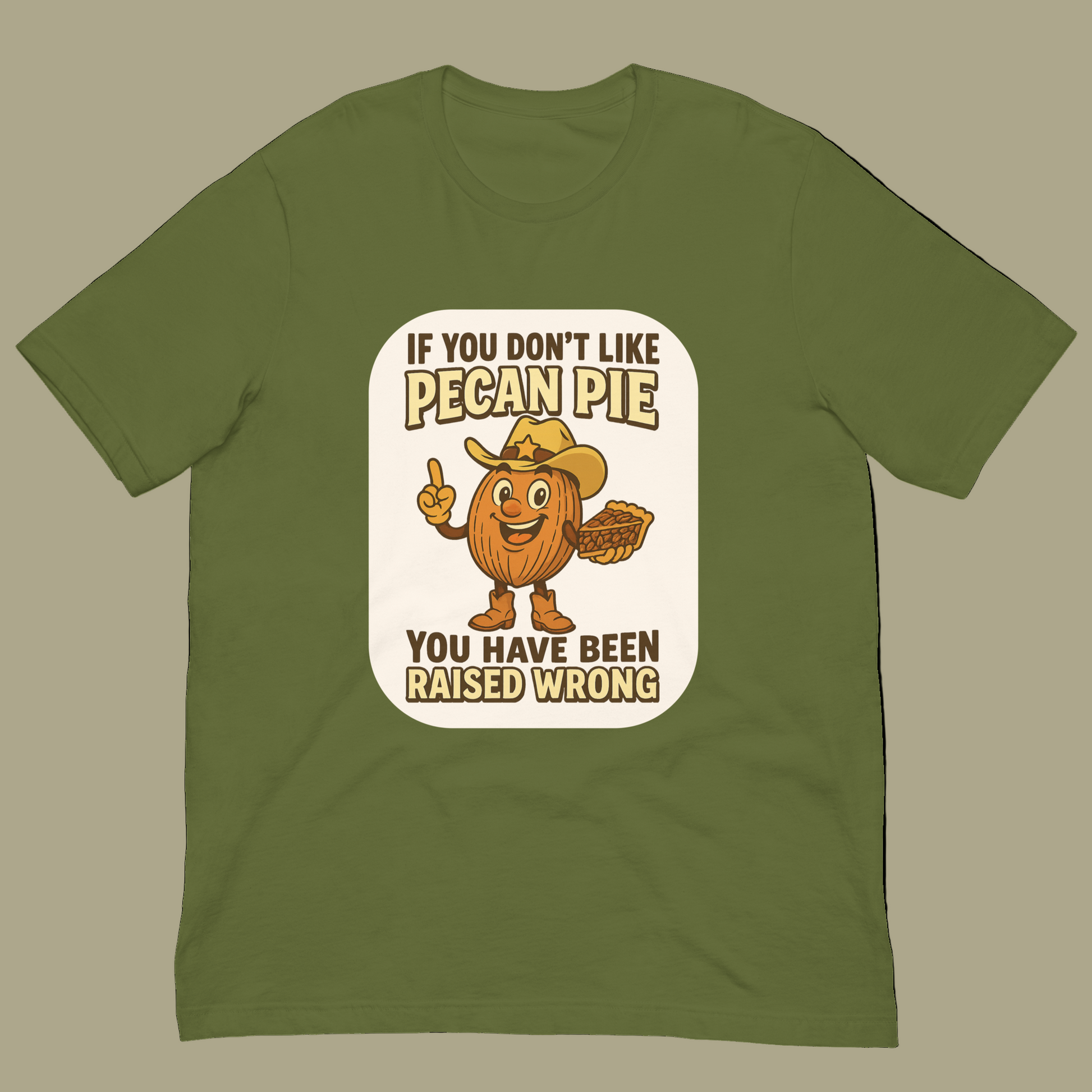 Bella+Canvas 3001U t-shirt made in USA featuring cartoon pecan cowboy holding pie with text ‘If you don’t like pecan pie, you have been raised wrong.’